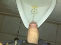 peeing at urinal