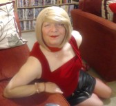 Linda wearing a Leather Mini-skirt