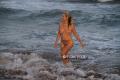 Flashing and nude on the beach playing with a bl...