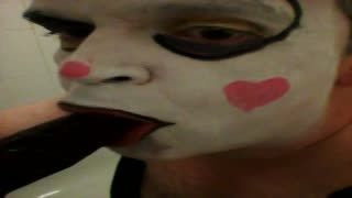 Anal - up close clown sucking dildo