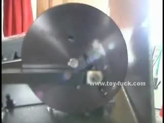 Machines - Suspended chick enjoys getting fucked by a dildo...